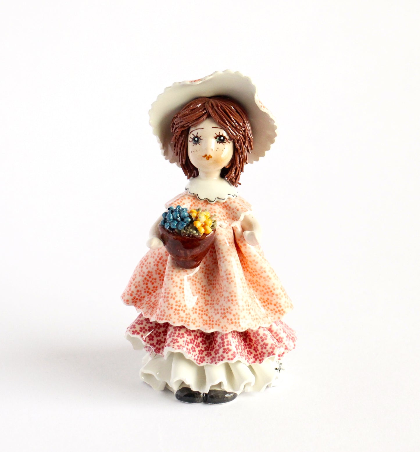 Standing doll with fruit