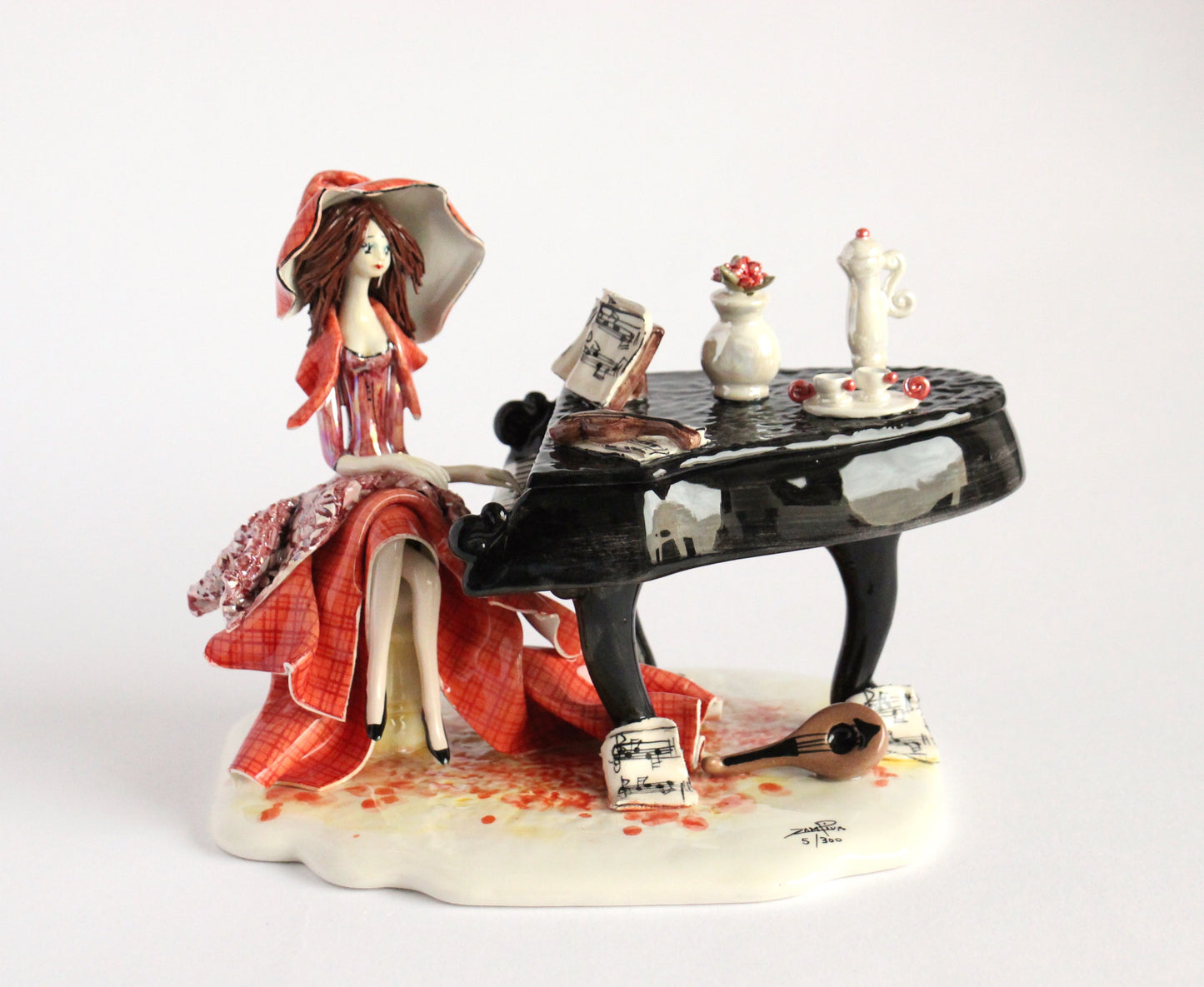 sitting lady with a piano