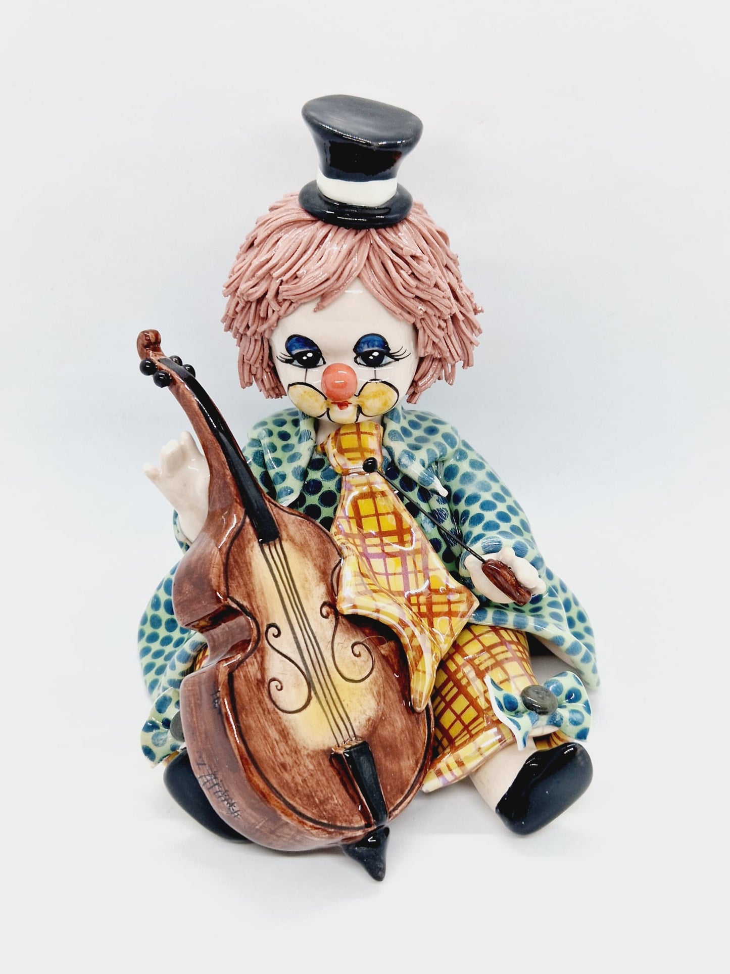 Clown playing cello