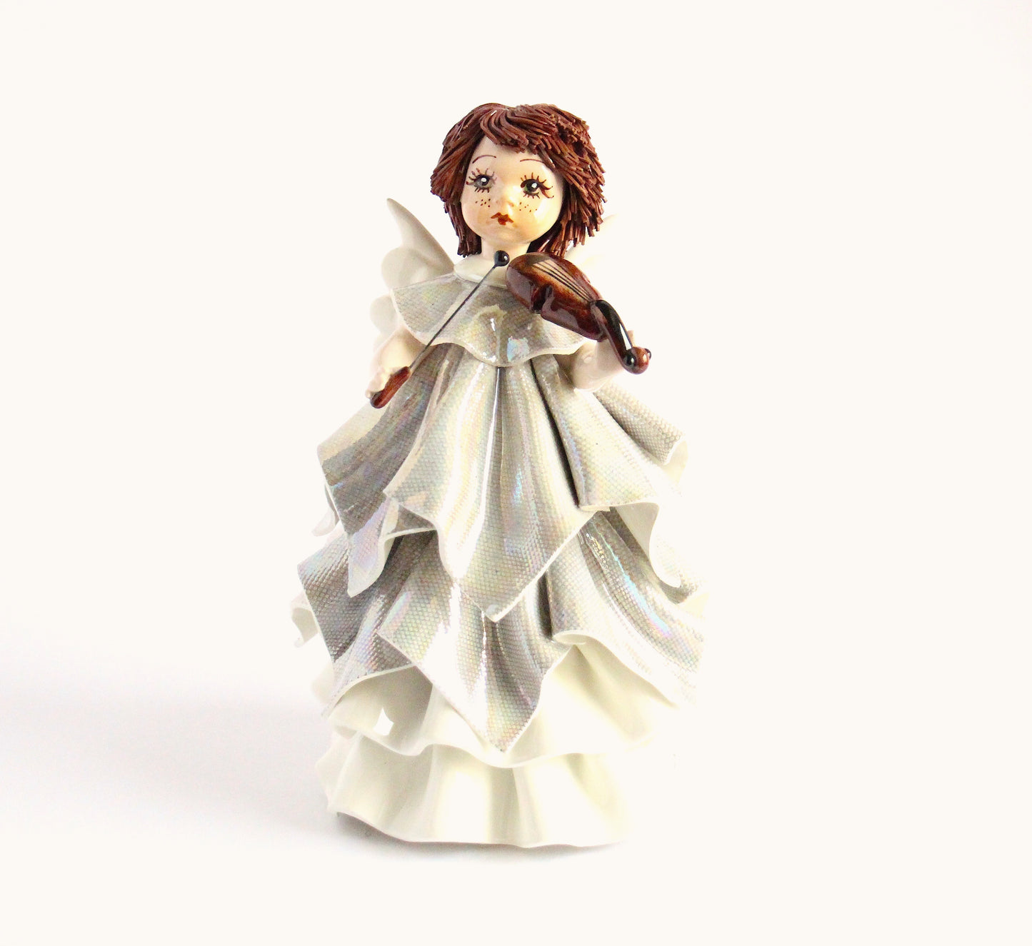 Standing angel playing violin