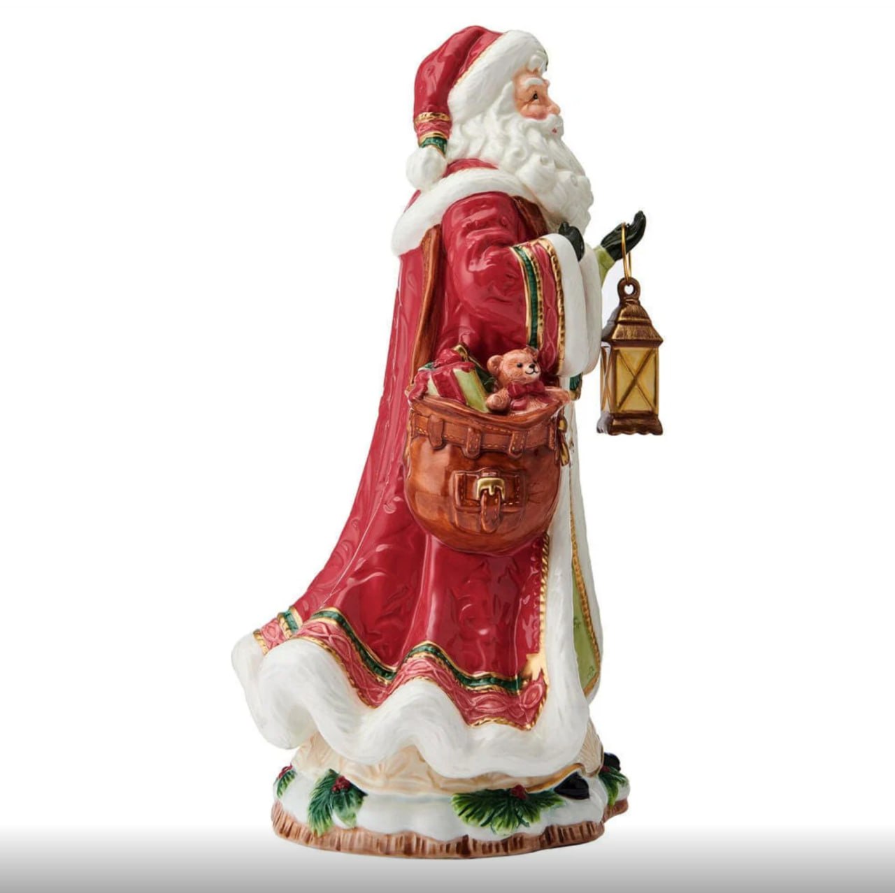 Santa figurine holding lantern