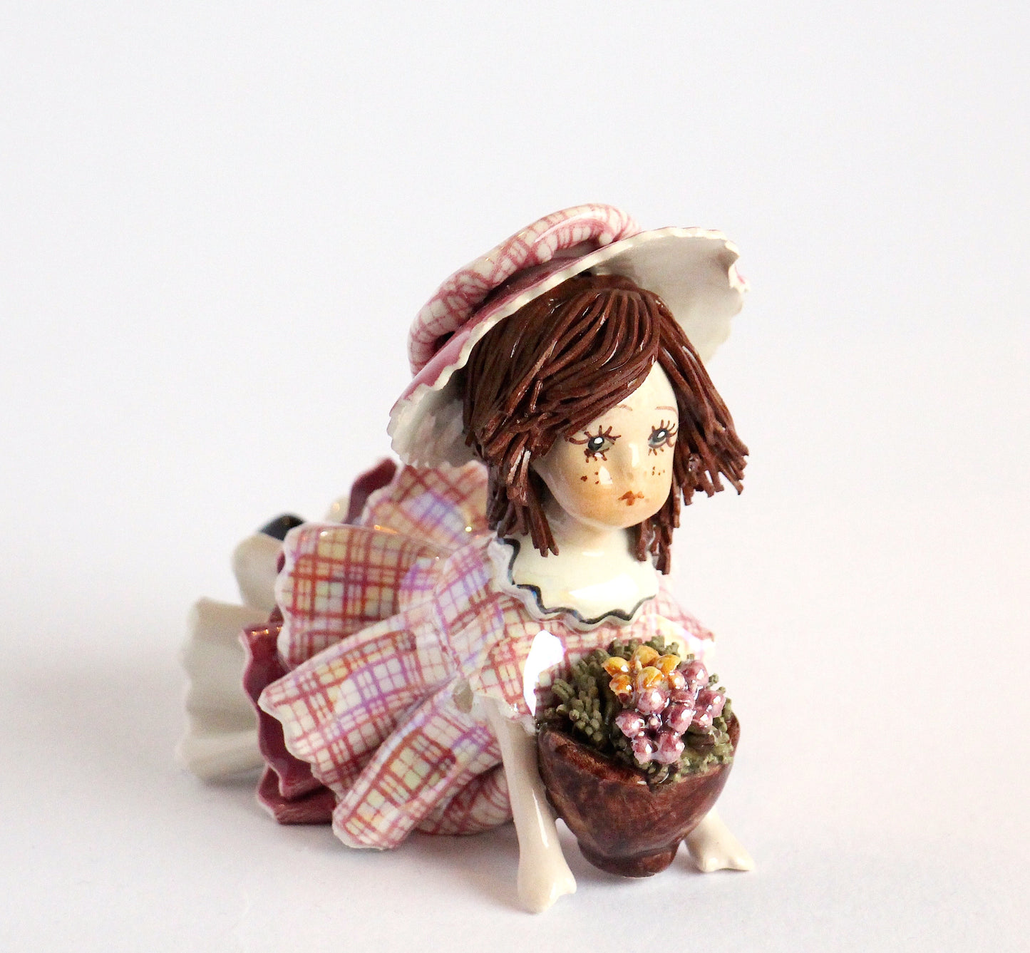 lying doll with flowers