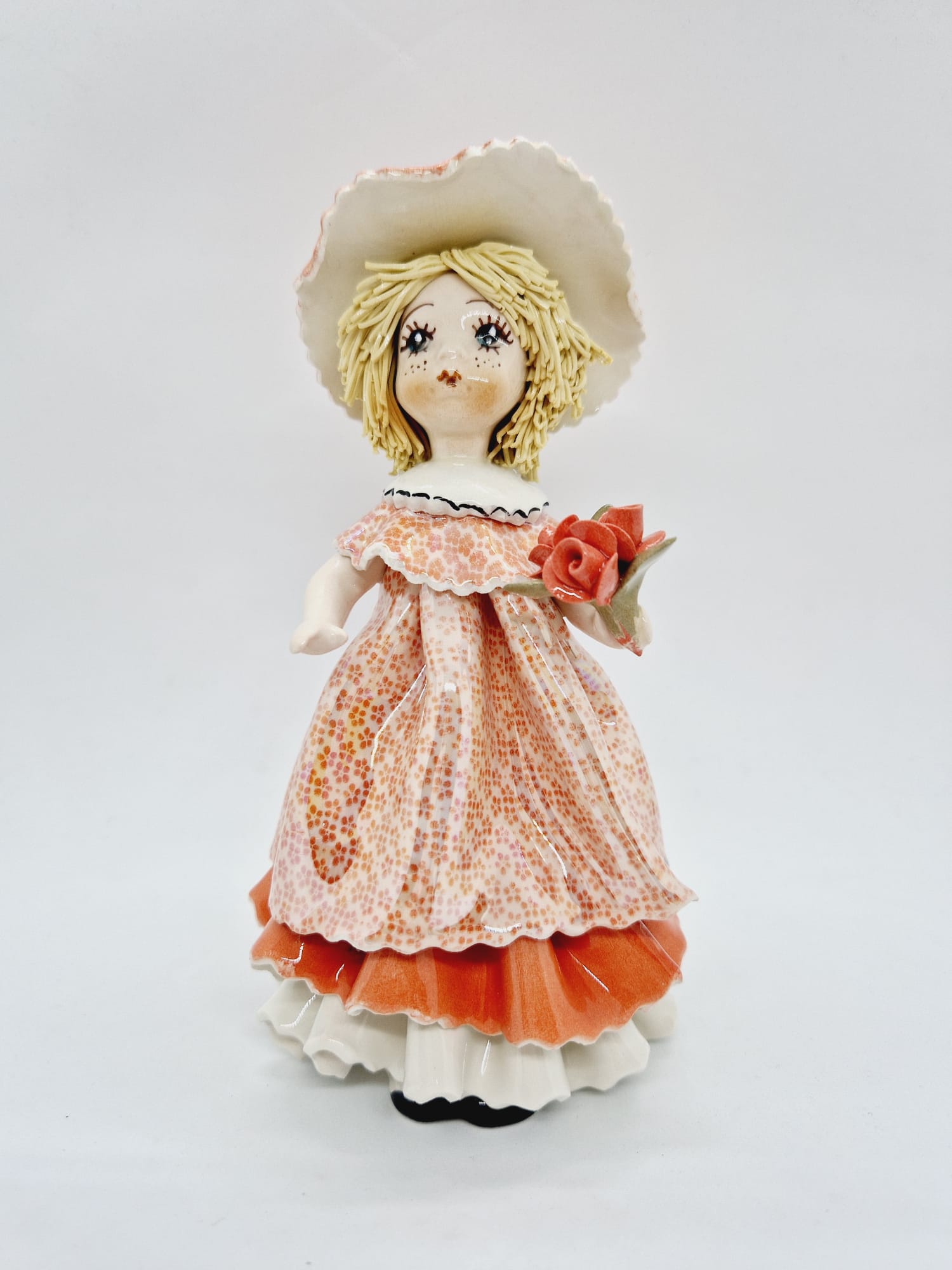 Standing ady with a flower