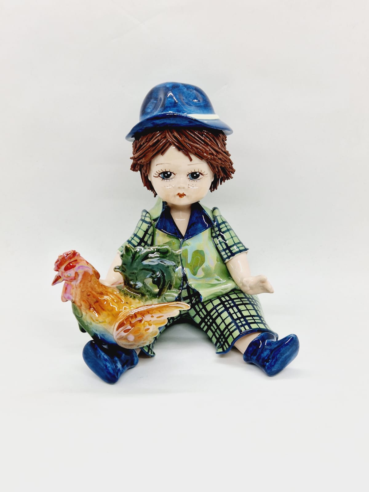 Boy with a rooster
