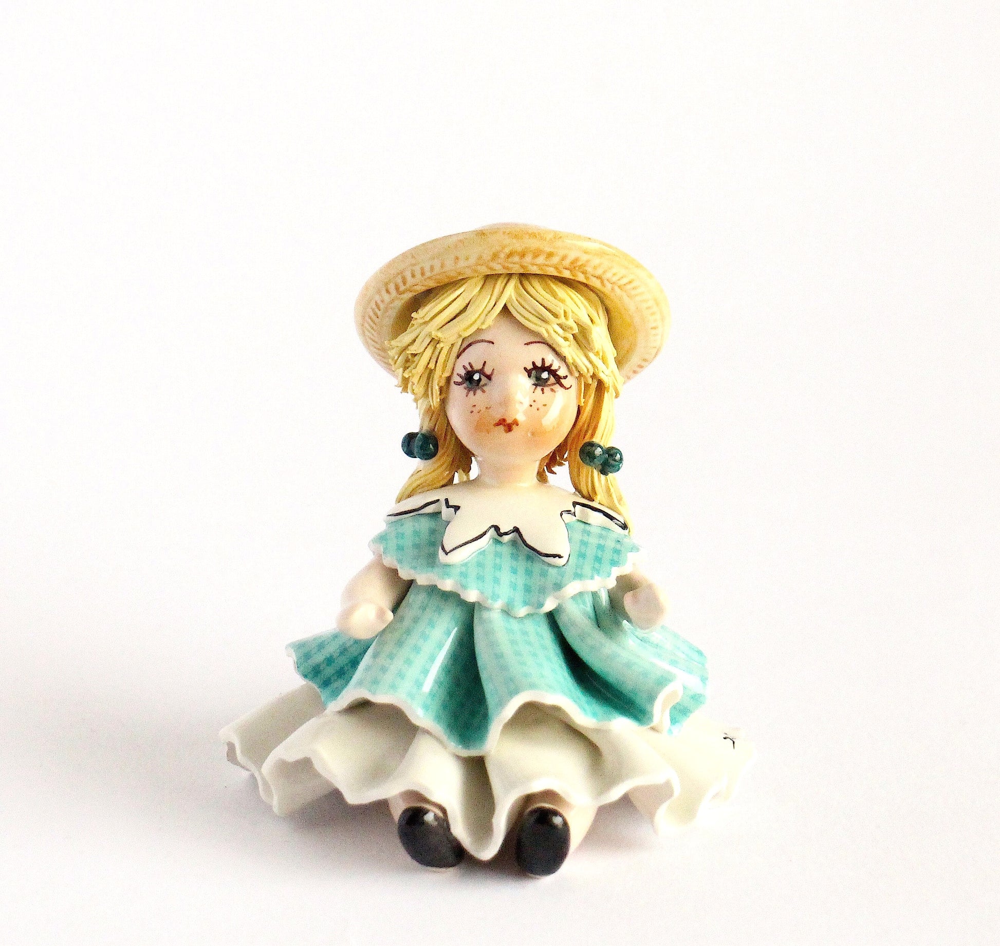 Porcelain doll- green drees