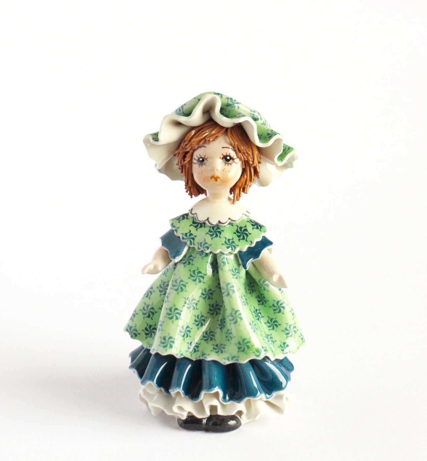 Doll with dark green