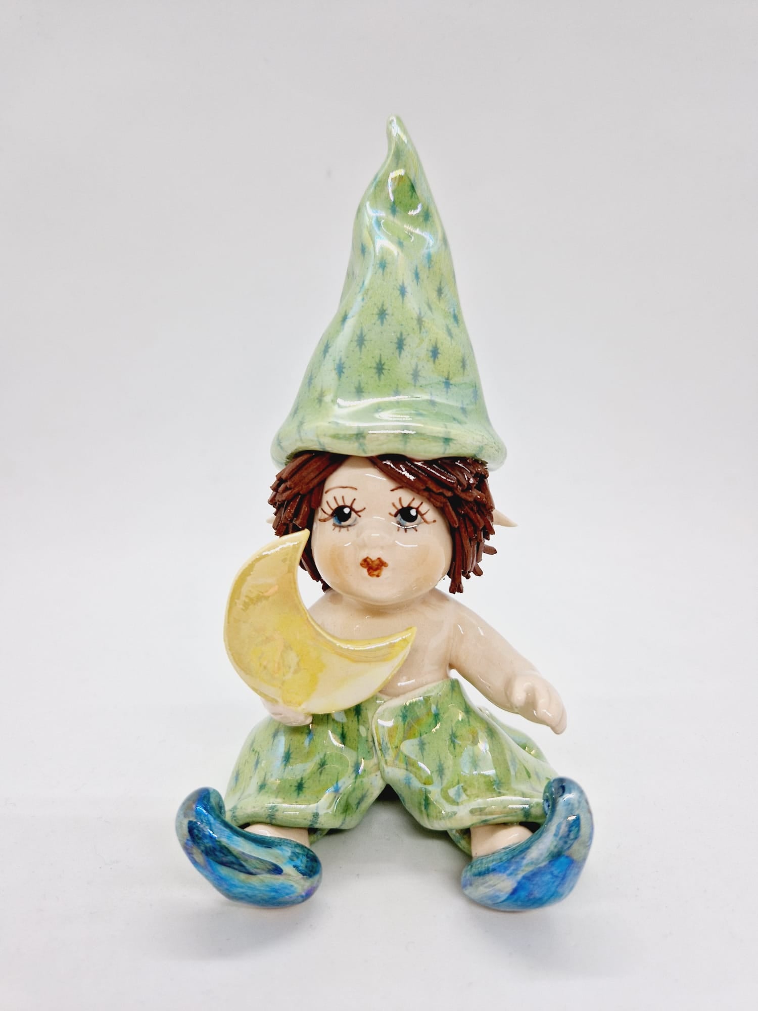 Elf holding the moon