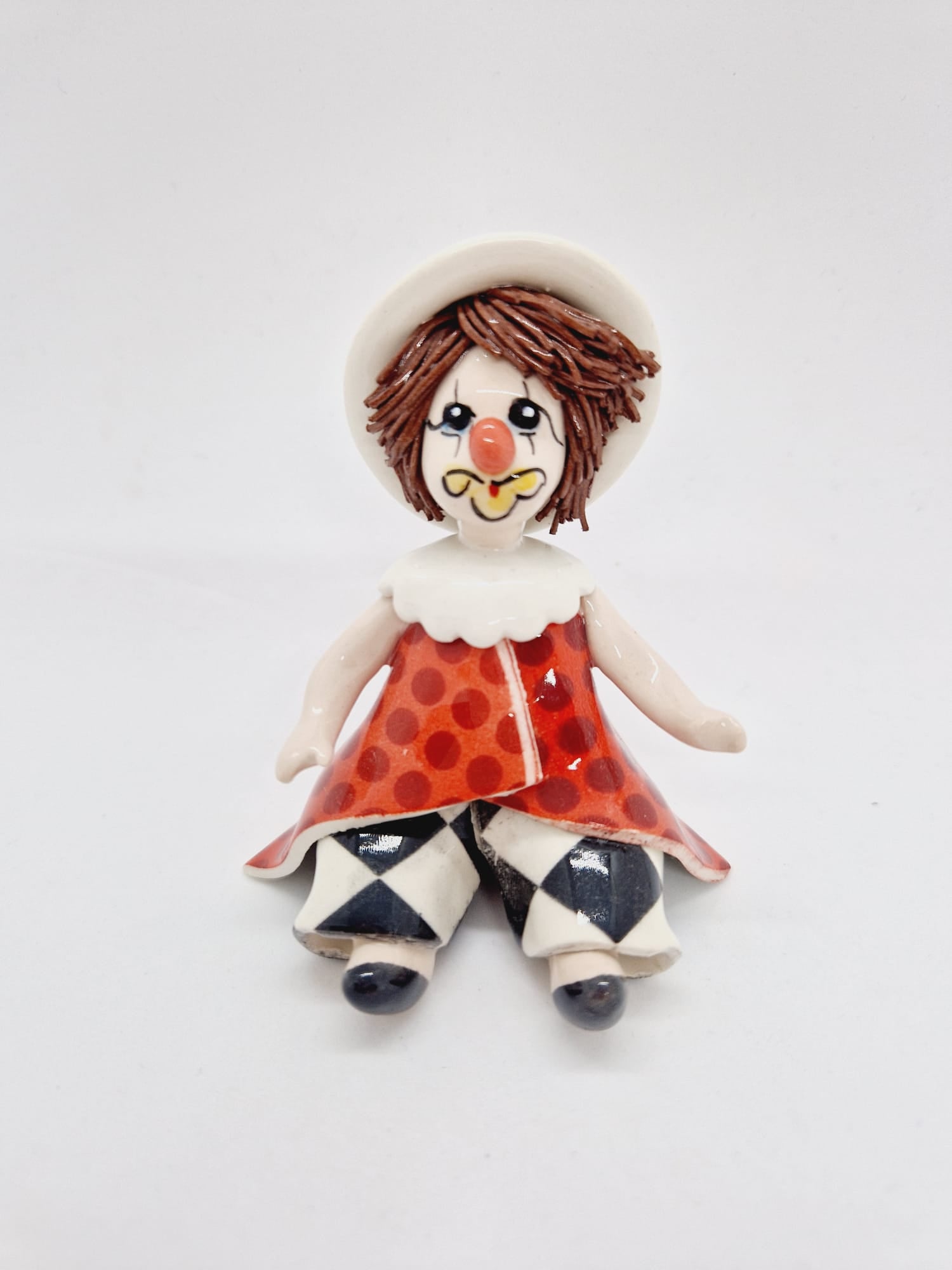 Sitting circus clown