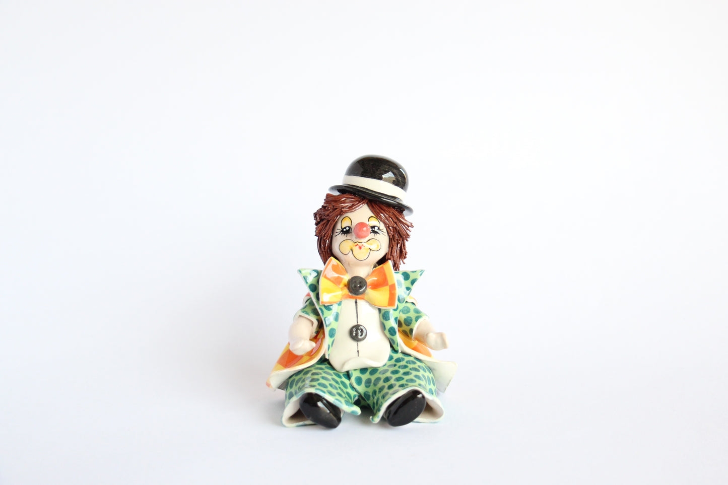 Sitting clown with hat