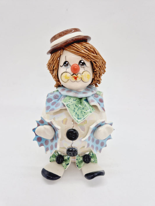 Standing clown with open arms