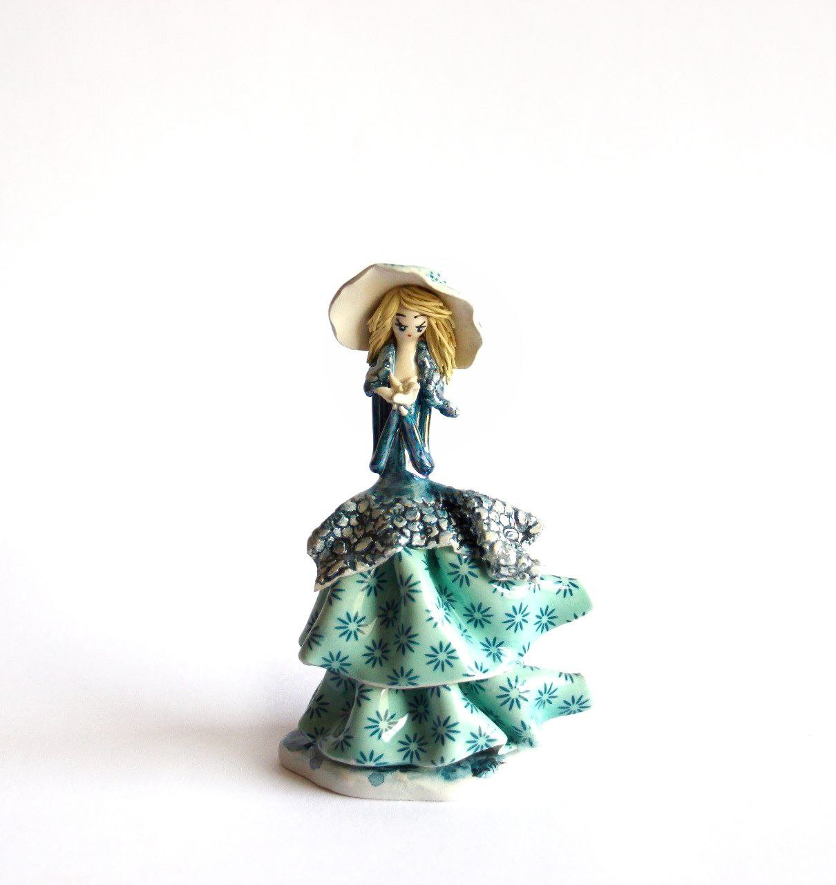 Lady with green flowers