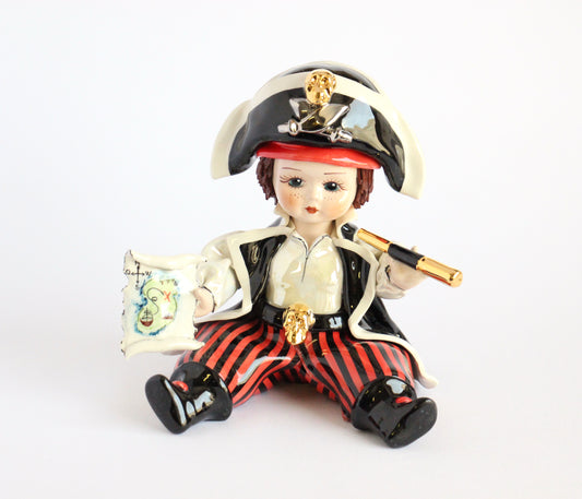 Sitting pirate with map