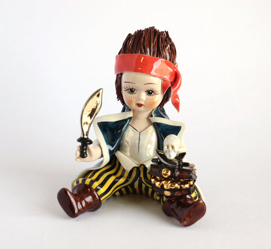 Sitting pirate with treasure